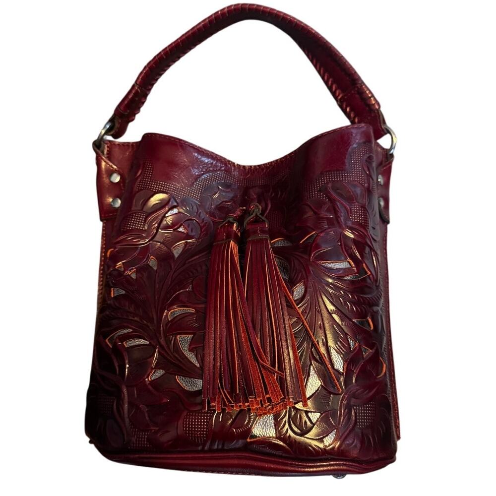 Patricia Nash Otavia Tooled Leather Cutout Bucket Bag Magenta Beet Tassel